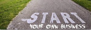 start your own business written on a road